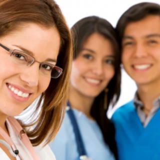A group of smiling healthcare professionals.