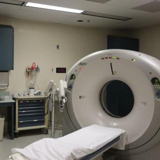 An MRI machine in a hospital room, ready for patient diagnostic imaging.