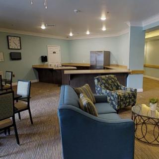 A cozy living room with comfortable seating and modern decor.