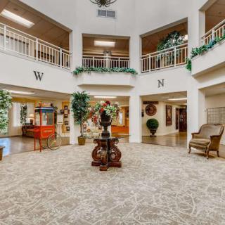 Elegant lobby with seating and decorative accents.