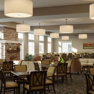A spacious and elegantly designed dining room with multiple tables and chairs, featuring modern lighting fixtures and large windows allowing natural light to enter.