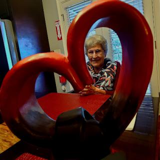 A warm moment captured through an artistic sculpture of a heart.