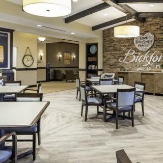 A modern dining area with elegant furnishings and stylish lighting.