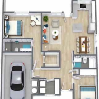 A detailed floor plan of a house featuring a garage, two bedrooms, a living room, kitchen, and bathroom.
