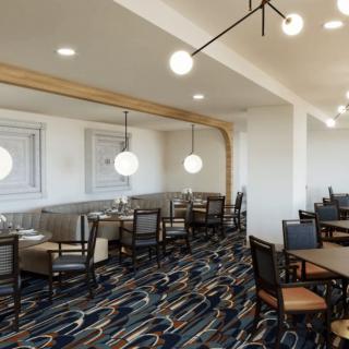 A modern restaurant interior with elegant lighting and seating.