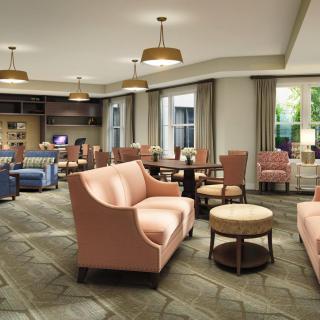 A modern lounge area with comfortable seating and stylish decor.