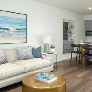 A modern living room with a comfortable sofa, stylish artwork, and a cozy atmosphere.