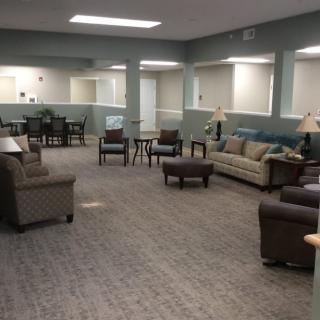 A spacious lobby with comfortable seating and a modern design.