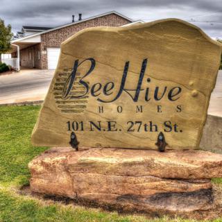 A stone sign for BeeHive Homes, located at 101 N.E. 27th St.