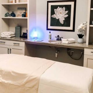 A serene massage room equipped for a relaxing spa experience.