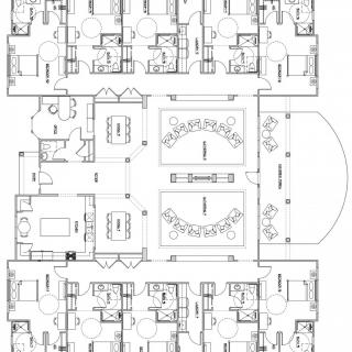 A detailed architectural floor plan showing the layout of multiple residential units and communal spaces.