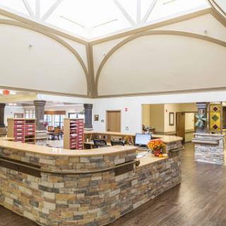 A welcoming reception area featuring a blend of modern and natural elements.