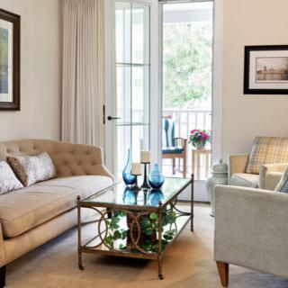 A cozy living room with stylish furniture and abundant natural light.