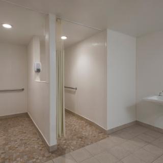 A clean and modern restroom with accessible features.