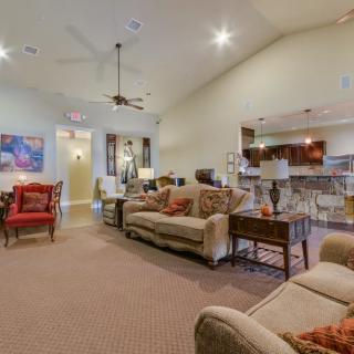 Spacious living room with comfortable seating and modern decor.