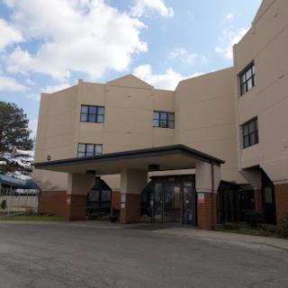 A modern commercial building with a welcoming entrance.