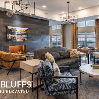 A contemporary living space featuring stylish furniture and elegant lighting.