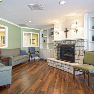 Cozy living room with a fireplace and comfortable seating.