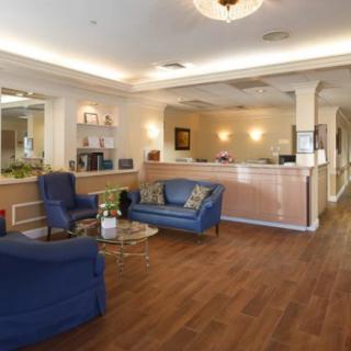 A welcoming lobby area with comfortable seating and a reception desk.