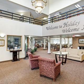 A spacious lobby with comfortable seating and a welcoming atmosphere.