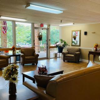 A cozy waiting area with comfortable seating and a welcoming atmosphere.