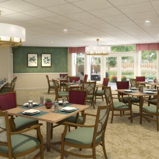 A cozy and elegantly decorated dining room with multiple tables and chairs, ready for guests.
