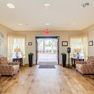 A welcoming lobby with comfortable seating and warm lighting.