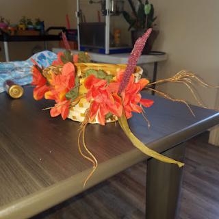 A vibrant, handmade floral arrangement displayed on a tabletop.