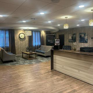 A modern lobby featuring comfortable seating and a welcoming reception area.