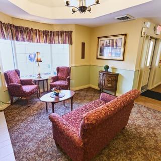 A cozy living room with comfortable seating and warm decor.