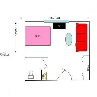 Studio apartment floor plan with furniture layout.