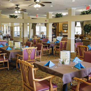 A well-arranged dining area with decorated tables and comfortable seating.