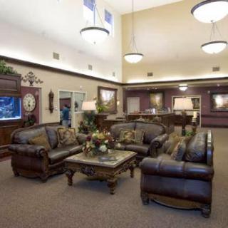 A spacious and inviting living room area with comfortable seating and elegant decor.