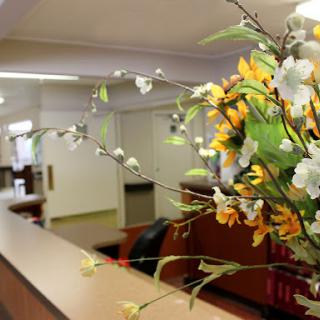 A beautifully arranged floral display enhances the welcoming atmosphere of the lobby.