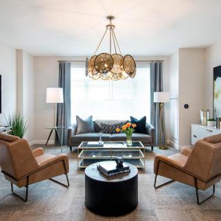 A modern living room featuring stylish furniture and decor.