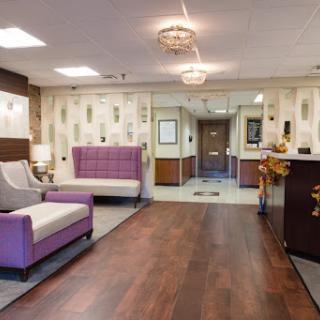 A stylish and modern lobby area featuring a mix of comfortable seating and elegant decor.