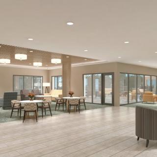 A modern, open-concept lounge and dining area with contemporary furniture and lighting.