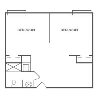 A floor plan showing two bedrooms and a bathroom layout.