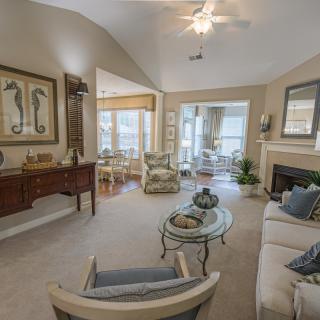 A cozy living room with elegant furniture and soft lighting.