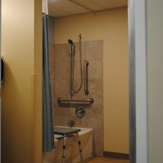 An accessible shower area in a medical facility.