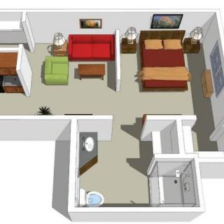 A 3D floor plan of an apartment with a bedroom, living area, and bathroom.