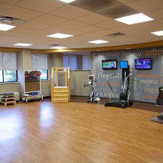 A well-equipped fitness center designed for rehabilitation and exercise.
