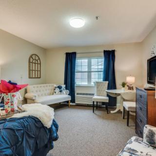 A cozy living room with stylish furniture and decor.