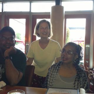 A cheerful gathering of friends at a restaurant.
