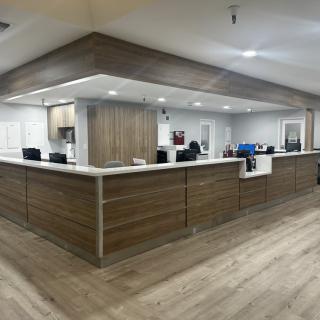 Modern reception desk in an office setting.