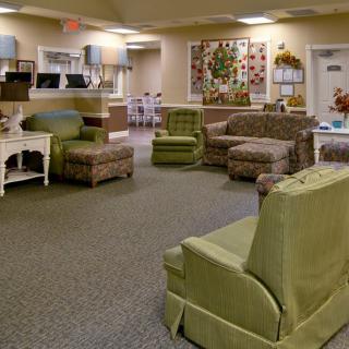 A cozy living room with comfortable seating and warm decor.