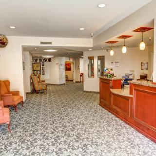 A welcoming lobby area with a reception desk and comfortable seating.