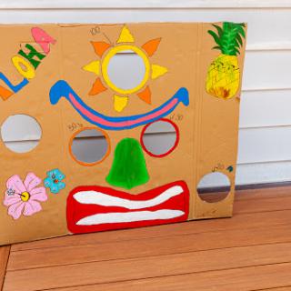 A vibrant and playful homemade game board featuring cheerful designs, ideal for children's activities.