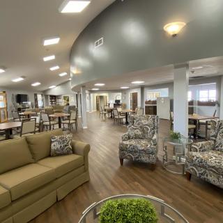 A modern and spacious lounge area with comfortable seating and stylish decor.