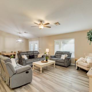 Spacious living room with comfortable seating and modern decor.